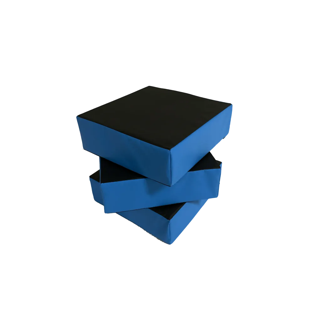 Set of three blue foam stepping blocks with black PVC-covered tops stacked unevenly.
